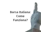 Scultura di una mano che punta il dito indice verso l'alto, con testo "Borsa Italiana: Come Funziona?".