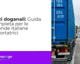 Guida completa sui dazi doganali per le aziende italiane esportatrici, con un camion che trasporta un container blu.